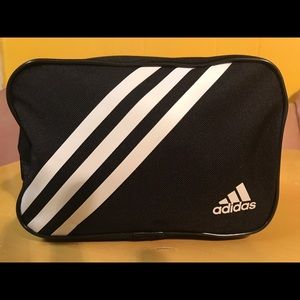 - Adidas brand handy bag.